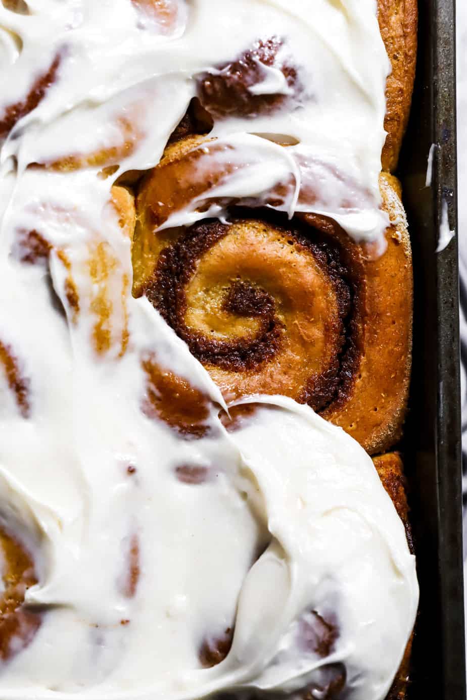 cinnamon roll iced close up