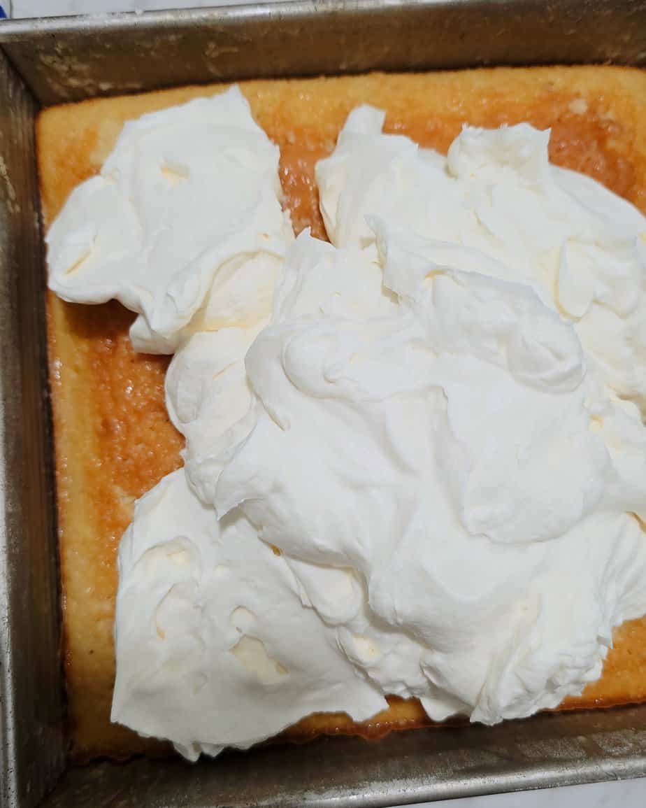 whipped cream topping on cake