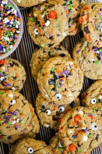 monster cookies on cooling rack with halloween sprinkles